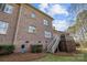 Brick house exterior with deck and stairs at 15409 Brem Ln, Charlotte, NC 28277