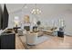 Living room with hardwood floors and a fireplace at 15409 Brem Ln, Charlotte, NC 28277