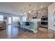 Modern kitchen with stainless steel appliances and an island at 16303 Cozy Cove Rd, Charlotte, NC 28278