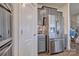 Kitchen boasts stainless steel refrigerator and ample cabinet space at 16303 Cozy Cove Rd, Charlotte, NC 28278