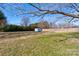 Spacious backyard with storage shed and wooden fence at 1691 Montevista Dr, Shelby, NC 28150