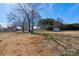 Spacious backyard with shed and mature trees at 1691 Montevista Dr, Shelby, NC 28150