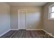 Bright bedroom with wood-look floors and ample closet space at 1691 Montevista Dr, Shelby, NC 28150