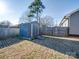 Spacious backyard with storage shed and wooden fence at 17 Walnut St, China Grove, NC 28023