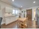 White shaker cabinets and granite countertops in the kitchen at 17 Walnut St, China Grove, NC 28023