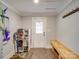 Functional laundry room with storage shelves and built-in bench at 17 Walnut St, China Grove, NC 28023