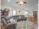 Spacious living room with sectional sofa and hardwood floors at 17 Walnut St, China Grove, NC 28023