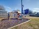 Wooden playset with slide and swingset in backyard at 17 Walnut St, China Grove, NC 28023