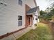 Inviting front entrance with covered porch at 17004 Commons Creek Dr, Charlotte, NC 28277