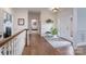 Inviting foyer with hardwood floors, neutral walls, and ample natural light from the front door at 1915 Cavendale Dr, Rock Hill, SC 29732