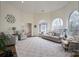 Bright living room with a vaulted ceiling, large arched windows, and neutral decor at 1915 Cavendale Dr, Rock Hill, SC 29732