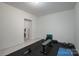 Minimalist workout room equipped with a weight bench and rubber flooring at 1915 Cavendale Dr, Rock Hill, SC 29732