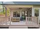 Relaxing back deck with wooden railings and comfortable seating at 2043 Shenandoah Ave, Charlotte, NC 28205