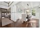 Bright dining room with hardwood floors and elegant chandelier at 2043 Shenandoah Ave, Charlotte, NC 28205