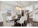 Elegant dining room with hardwood floors and large windows at 2043 Shenandoah Ave, Charlotte, NC 28205