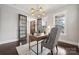 Home office featuring hardwood floors and French doors at 2043 Shenandoah Ave, Charlotte, NC 28205