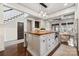 Open kitchen with large island and built-in oven at 2043 Shenandoah Ave, Charlotte, NC 28205