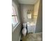 Simple bathroom featuring a toilet and sink vanity at 2505 Druid Hills Way, Charlotte, NC 28206