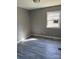 Bedroom with gray walls and wood-look flooring at 2505 Druid Hills Way, Charlotte, NC 28206