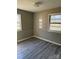 Bedroom with gray walls and wood-look flooring at 2505 Druid Hills Way, Charlotte, NC 28206