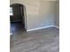 Living room with gray walls and wood-look flooring at 2505 Druid Hills Way, Charlotte, NC 28206