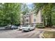 Exterior view of a charming condo building with ample parking at 2514 Cranbrook Ln # 5, Charlotte, NC 28207