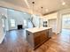 Modern kitchen with island and stainless steel appliances at 2558 Red Hill Nw St # 51, Concord, NC 28027