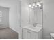 Clean bathroom with vanity, mirror, and single sink at 3026 Uxbridge Woods Ct, Charlotte, NC 28205