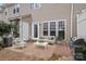 Private patio with seating area, perfect for outdoor relaxation at 3026 Uxbridge Woods Ct, Charlotte, NC 28205