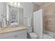 Clean bathroom with a shower/tub combo and vanity at 303 Hillside Ave, Charlotte, NC 28209