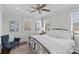 Spacious bedroom with a comfortable bed and sitting area at 303 Hillside Ave, Charlotte, NC 28209