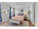 Charming bedroom with a comfortable bed and a neutral color scheme at 303 Hillside Ave, Charlotte, NC 28209