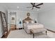 Spacious main bedroom with a king-size bed and sitting area at 303 Hillside Ave, Charlotte, NC 28209