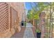 Brick patio with seating area, grill, and stone pathway at 303 Hillside Ave, Charlotte, NC 28209