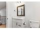 Modern bathroom with white vanity and quartz countertop at 303 S Greene St, Wadesboro, NC 28170