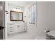 Clean bathroom with white vanity and marble countertops at 303 S Greene St, Wadesboro, NC 28170