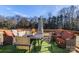 Outdoor deck with seating area and artificial turf at 303 S Greene St, Wadesboro, NC 28170