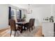 Formal dining room with dark wood table and leather chairs at 303 S Greene St, Wadesboro, NC 28170