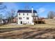 White two-story house with a deck and backyard at 303 S Greene St, Wadesboro, NC 28170