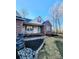 House exterior showcasing a brick and beige color scheme, landscaping, and a stone fountain at 306 Bluegill Ln, Statesville, NC 28625