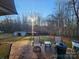 Relaxing patio area overlooking a wooded backyard at 306 Bluegill Ln, Statesville, NC 28625