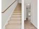 Carpeted staircase with wood railing leading to upper level at 3148 Ora Smith Rd, Lincolnton, NC 28092