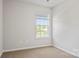 Spacious bedroom with neutral walls, carpeted floor, and large window at 3156 Ora Smith Rd, Lincolnton, NC 28092