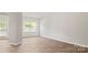 Bright dining room with hardwood floors and large window at 3156 Ora Smith Rd, Lincolnton, NC 28092