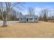 Charming single-story home featuring a cozy front porch, gray siding, and a well-maintained lawn at 368 Luther Scronce Rd, Vale, NC 28168