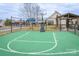 Green basketball court with lines and hoop at 3836 Lake Breeze Dr, Sherrills Ford, NC 28673