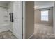 Small bathroom with shower/tub combo and neutral decor at 3836 Lake Breeze Dr, Sherrills Ford, NC 28673