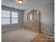 Well-lit bedroom with carpeted floors and ample space at 3836 Lake Breeze Dr, Sherrills Ford, NC 28673