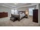 Main bedroom with carpeted floors and large windows at 3836 Lake Breeze Dr, Sherrills Ford, NC 28673