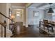 Bright dining room features hardwood floors and wainscoting at 3836 Lake Breeze Dr, Sherrills Ford, NC 28673